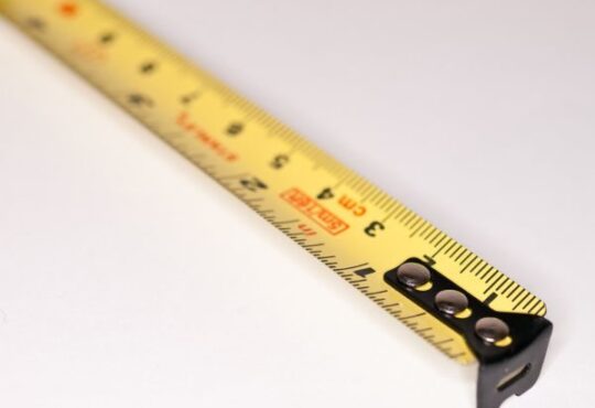 Tape measure close-up for measuring a lawn