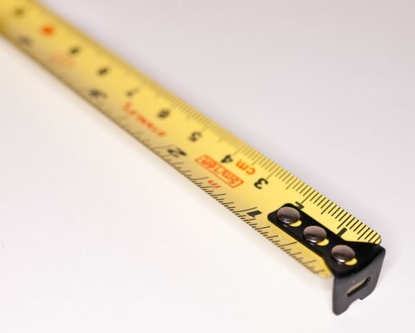 Tape measure close-up for measuring a lawn